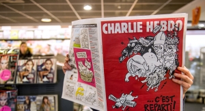 05.01.2016 - Un Dieu assassin en Une du numéro anniversaire de Charlie Hebdo